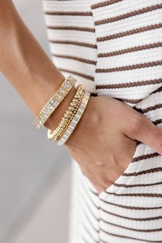 Upgrade your wardrobe with the Verona Gold Bracelet! This statement piece features gold beads that are perfect for stacking and layering! 14kt over brass Stretch bracelet 7" stretch Simply fabulous! Trendy Gold Stackable Stretch Bracelet, Trendy Gold Stretch Bracelet For Everyday, Gold-tone Stackable Bracelets, Adjustable Gold Tennis Bracelet For Everyday Wear, Trendy Gold Stretch Bangle Bracelet, Gold Stackable Stretch Bangle Bracelet, Elegant Stacked Gold Bracelets, Elegant Gold Stacked Bracelets, Gold Jubilee Tennis Bracelet For Everyday