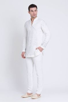 Ivory linen kurta with thread embroidery in geometric, floral pattern. Paired with a pant. - Aza Fashions Festive White Linen Sets, Summer Linen Kurta With Chikankari Embroidery, Spring Linen Kurta With Chikankari Embroidery, Traditional White Linen Sets, White Cotton Kurta With Geometric Embroidery, White Linen Fitted Kurta, Elegant White Linen Kurta, White Fitted Linen Kurta, White Linen Eid Sets