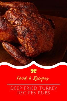 a cooked turkey sitting on top of a wooden cutting board with the words food & recipes deep fried turkey