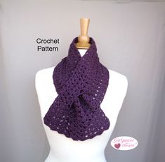 a purple crochet scarf on top of a white mannequin