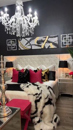 a bedroom with black, white and red decor