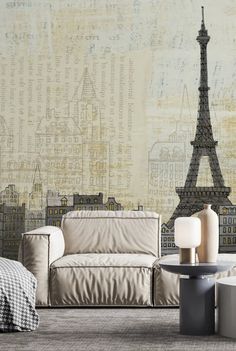 the eiffel tower wallpaper mural in a living room with couches and tables