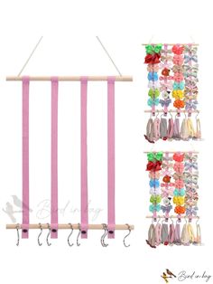 the pink and white wall hanging rack has several pairs of shoes on it