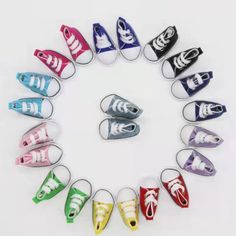 colorful shoes arranged in a circle with the word hello written on each shoe and bottom