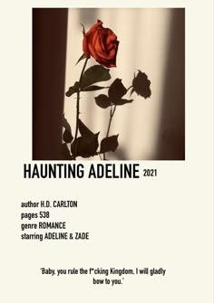 a red rose sitting on top of a table next to a white sheet with the words, haunting adeline 2012