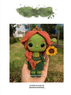 a crocheted doll holding a sunflower in her hand with the caption's name on it