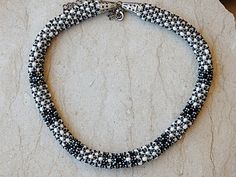 Elegant White Spacer Beads, Elegant White Beaded Necklaces With Polished Beads, White Necklace With Silver Beads, Elegant White Beaded Necklace With Polished Beads, Handmade Elegant White Beads, Elegant Handmade White Beads, Elegant White Round Beads, White Beaded Necklaces With Polished Round Beads, White Polished Beaded Necklaces