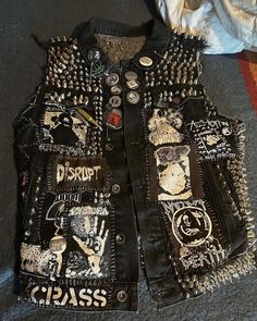 Introducing our Punk Rock Leather Studded Vest - a must-have for fans of edgy fashion! This Vest features a striking combination of Gothic patchwork, Cramps-inspired design, and an opulent Motorhead aesthetic. Perfect for fans of Lemmy and Cannibal Corpse, this outerwear piece is both a tribute to punk rock icons and a bold fashion statement. Key Details: - Eye-catching Suicidal Tendencies patch on the front. - A collection of impressive badges and patches, carefully curated for a punk-inspired Punk Fashion Diy, Patchwork Fashion, Battle Jacket, Style Vest, Punk Inspiration, Stud Style, Moto Style, Punk Outfits, Edgy Fashion