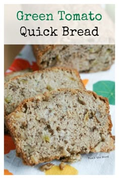 two slices of green tomato quick bread on top of a colorful napkin with the words, green tomato quick bread