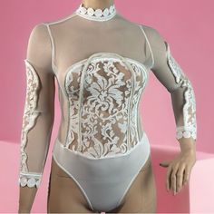 Women’s Banjul Burn Out Mesh Lace Roped Body Suit-White 93% Polyester 7% Spandex Beautiful Lace Roped Trim Design Decorative Embroidered High Neck Lightweight/Stretchable Material White Stretch Party Top, White Stretch Top For Party, White Fitted Top For Party, Fitted White Party Top, Sheer White Bodysuit For Spring, Spring Sheer White Bodysuit, White Sheer Stretch Bodysuit, Stretch Sheer White Tops, White Stretch Sheer Top