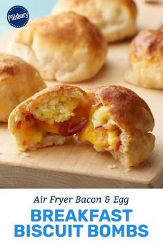 breakfast biscuits on a cutting board with the words air fryer bacon and egg