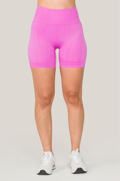 A winner for your next workout. Offering a complete range of motion and reliable seamless support, these flattering bright pink seamless shorts for women will inspire you to go far. This style of bright pink seamless workout shorts runs small. Please consider sizing up. High Stretch Pink Athletic Shorts For Sports, Pink High Stretch Athletic Shorts For Sports, High Stretch Pink Sports Shorts, Seamless Fabric Athletic Training Shorts, High Stretch Pink Athleisure Shorts, Seamless Fabric Athletic Shorts For Training, High Stretch Pink Biker Shorts For Workout, Pink Stretch Seamless Biker Shorts, Pink Seamless Stretch Biker Shorts