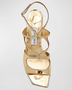 Jimmy Choo Azilia Strappy Metallic Sandal in Gold Square open toe Adjustable ankle strap Caged vamp Metallic faux leather upper, lining, and sole 1.75” (45 mm) block heel Made in Spain Metallic Sandals, Matte Gold, Wedding Shoes, Leather Sandals, Jimmy Choo, Block Heels, Ankle Strap, Open Toe, Leather Upper