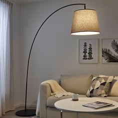 SKOTTORP / SKAFTET Floor lamp base w light blb, arched, light gray, Height: 84 ". With this floor lamp you enjoy overhead lighting – with no ceiling outlet. And since you can slide the lamp base under a sofa, it takes up little floor space. A smart and flexible solution, right? Frame: Steel. Peru House, Ikea Floor Lamp, Arch Light, Ikea Lamp, Lamp Shade Frame, Floor Lamp Base, Arched Floor Lamp, Floor Lamps Living Room, Reading Lamp Floor