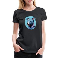 a woman wearing a black shirt with a blue dog on it's chest and head