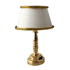 PRICES MAY VARY. A Timeless Piece: Realistic battery powered dollhouse accent lamp; gold-finish base with a beautiful cream colored shade; Suitable for 3 inch to 12 inch dolls (1/24 scale to 1/6 scale) Elegant & Class: Masterfully crafted, the LED lamp incorporates a small battery inside its base with a switch to turn the light on and off. The battery is included in the unit so you can start using the light right away. If needed, the battery is replaceable using a small screwdriver. Dimensions: Dollhouse Table, Mini Dollhouse, Bedside Desk, Small Table Lamp, Accent Lamp, Dollhouse Accessories, Lamp Led, Dolls House, Vintage Bohemian