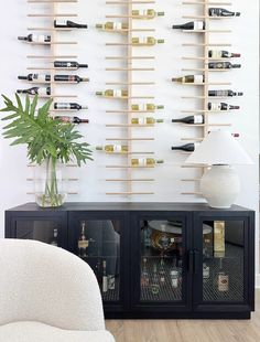 a wine rack with many bottles on it