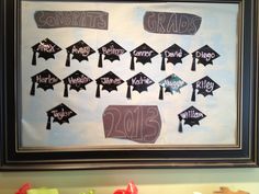 graduation decorations are displayed on a bulletin board