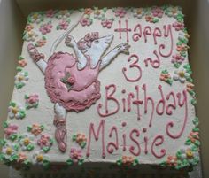 a birthday cake with an image of a ballerina on the front and pink icing