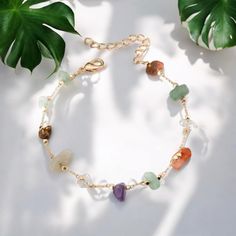 This colorful stone bead bracelet is a real eye-catcher and brings joy to any look. It is made of hand-picked, natural stone beads in vibrant colors. Each bead tells its own story and gives the bracelet an individual touch. The different surface structures of the stones provide an interesting feel and reflect the light in a fascinating way. Whether as a cheerful accessory for everyday life or as a special highlight for festive occasions - this bracelet is versatile and suits every style. Wear it Bohemian Gemstone Beaded Bracelets As Gift, Bohemian Agate Beaded Bracelets With Stones, Bohemian Agate Crystal Bracelet For Meditation, Natural Stones Crystal Bracelet For Meditation, Bohemian Multicolor Agate Crystal Bracelet, Bohemian Beaded Bracelets With Round Stones, Gold Bohemian Beaded Bracelets With Stones, Bohemian Gold Beaded Bracelets With Stones, Bohemian Beaded Gemstone Bracelets