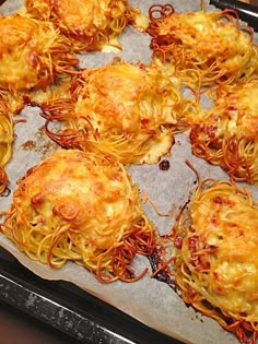 some food is laying out on a baking sheet and ready to be cooked in the oven