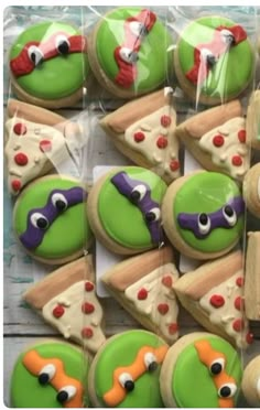 decorated cookies in the shape of teenage mutant turtles