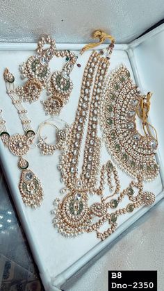 This is indian Pakistani Wedding Full Bridal Jewelery / Wear It on wedding , Nikah , Made with real Polki kundan Stones with pearls .  Included : Choker With Long Necklace  Earrings , Mathapatti ( Hair accessories ) . Hand Accessories . Nosepin . Shining Kundan Necklace With Earings And Tikka. For Wedding , Nikah , Sangeet , Baraat , For Bride. Thank You :) Kundan Bridal Accessories With Tilla For Marriage, Kundan Bridal Sets For Marriage, Traditional Hand Set Bridal Accessories For Wedding, Wedding Bridal Sets In Temple Jewelry Style, Bollywood Style Hand Set Bridal Necklace, Heavy Silver Bridal Necklace For Marriage, Festive Bridal Necklace With Stone Work For Marriage, Traditional Bridal Accessories With Stone Work For Wedding, Bollywood Style Bridal Sets With Intricate Design