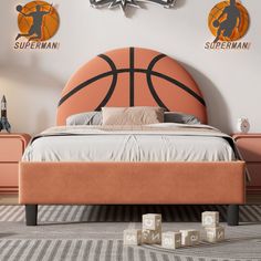 a bed with a basketball headboard on top of it next to two wooden blocks