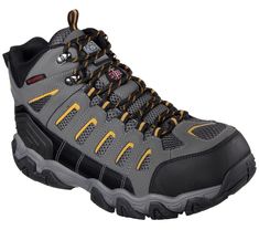 Stay protected and comfortable on all terrains with Skechers Work: Blais - Bixford ST. This waterproof hiking style work boot features a lace-up action leather, synthetic and mesh fabric upper with a Skechers Memory Foam insole and steel toe. | Skechers Men's Work: Blais - Bixford ST Sneaker Rugged Shock Resistant Work Boots, Sporty Durable Work Boots For Outdoor, Sporty Steel Toe Work Boots For Outdoor Activities, Slip-resistant Lace-up Hiking Boots For Outdoor Work, Sports Waterproof Boots With Reinforced Toe And Secure Fit, Rugged Lace-up Hiking Boots For Safety, Impact-resistant Lace-up Waterproof Boots For Outdoor Work, Lace-up Work Boots With Reinforced Toe, Impact Resistant Lace-up Waterproof Boots For Outdoor Work