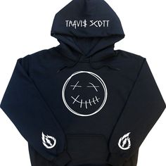 This Is The Travis Scott Hoodie With Dead Smile Face On The Front And La Flame Design On The Hood With Name On Both Sleeves On A Black Hoodie With White Print. Edgy White Winter Sweatshirt, Edgy White Sweatshirt For Fall, Travis Scott Hoodie, Running Hoodie, Outfit Hoodie, Mens Zip Hoodie, Flame Design, Hoodies Men Pullover, Under Armour Hoodie