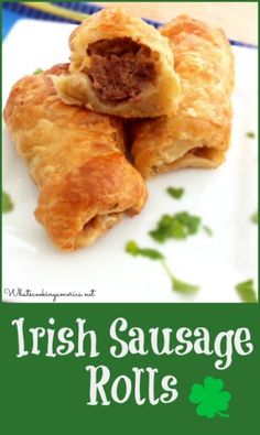 three sausage rolls on a white plate with green clovers around them and the words irish sausage rolls