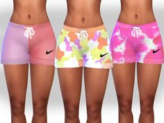 three women's shorts with different colors and sizes are shown in front of each other