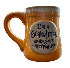 an orange coffee mug that says i'm a grandma whats your super power?