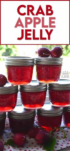 cranberry apple jelly in mason jars on a table