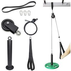 an assortment of exercise equipment including pulleys, straps and handles on a white background