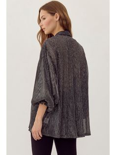 This Jodifl cardigan boasts an elegant, glossy chiffon material and delicate poet sleeves, adding a touch of sophistication to any outfit. The self-tie front allows for a customizable fit while maintaining a sheer, lightweight feel. Perfect for layering or wearing on its own for a chic, polished look. Details:- Glossy Chiffon Fabric- Poet Sleeves- Tie Front- Sheer, Lightweight Fabric Content:- 100% Polyester Elegant Puff Sleeve Cardigan For Spring, Chic Long Sleeve Outerwear With Sheer Sleeves, Chic Outerwear With Sheer Long Sleeves, Chic Fall Outerwear With Sheer Sleeves, Chic Puff Sleeve Outerwear For Parties, Chic Party Outerwear With Puff Sleeves, Black Party Blouse With Pleated Sleeves, Black Blouse With Pleated Sleeves For Party, Black Date Night Outfit