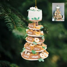 a christmas ornament hanging from a tree filled with donuts