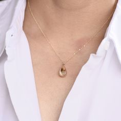 "14K Gold Teardrop Necklace - 14K Gold Adjustable Necklace This necklace is adjustable to 16\", 17\" or 18\" lengths. ★ The necklace is 14K solid gold. ★ 14K gold teardrop pendant is about 17mm x 8.5mm. Please read our policies before you place your order. https://www.etsy.com/shop/SashJewelry/policy?ref=shopinfo_policies_leftnav To see other Mother daughter necklace set click here: https://www.etsy.com/shop/SashJewelry?section_id=12441134&ref=shopsection_leftnav_1 To see other bracelets cli Teardrop 14k Yellow Gold Charm Necklaces, 14k Yellow Gold Teardrop Charm Necklaces, 14k Gold-filled Yellow Gold Teardrop Necklace, Yellow Gold Teardrop Necklace In 14k Gold Filled, 14k Gold Teardrop Necklace With Delicate Chain, 14k Yellow Gold Filled Teardrop Necklace, Everyday Yellow Gold Teardrop Necklace, Gold Drop Necklaces In 14k Gold, Dainty 14k Gold Teardrop Pendant Necklace