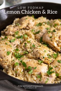 lemon chicken and rice in a skillet with parsley on top, ready to be eaten