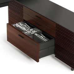 an office desk with drawers and file cabinets