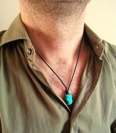 A simple rope necklace with natural turquoise stone pendant, stainless steel lobster clasp closure.  Minimalist style every day pendant necklace with genuine stone will be a great gift for him.  Turquoise represents wisdom, tranquility, protection, good fortune, and hope cotton wax cord thickness 1,5 mm turquoise stone bead approx: 15 x 10 mm For all products are used only genuine high-quality Italian leather, natural stones and wood. All metal materials are lead and nickel free.  /Gift wrapping and packaging/ :   All items ordered will be placed in a gift bag and shipped in a bubble mailer. /Jewelry care instructions/: Not recommended bathing, physical activity, swimming, sleeping while wearing jewelry. It may damage all the components of the product. Blue Stone Pendant, Moda Hippie, Lapis Jewelry, Pendant For Men, Natural Turquoise Stone, Leather Corded Necklace, Jewelry Care Instructions, Unisex Gift, Stone Pendant Necklace