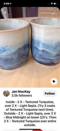 two blue and white bowls sitting on top of a wooden table next to each other