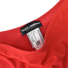 Dolce & Gabbana 2-piece swim suit in red nylon with gold hardware on the bottoms. Brand = Dolce & Gabbana Condition = 8.5/10, small stain on cup Size = Women's S Material = 100% Nylon SKU = 18299-32 Designer Fitted Swimwear For Swimming, Designer Summer Swimwear For Beach, Designer Beach Swimwear For Summer, Red Swimsuit, Cup Size, Swim Suit, Women Swimsuits, Gold Hardware, 2 Piece