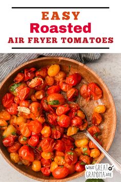 roasted tomatoes in a wooden bowl with text overlay that reads easy roasted air fryer tomatoes