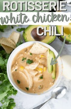 a bowl of rotissee white chicken chili with avocado and cilantro