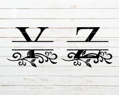 the letter v and y are made out of wood with black paint on it's sides