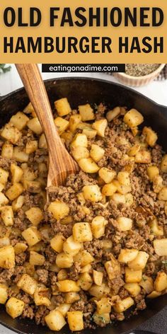 an old fashioned hamburger hashbrown in a skillet with a wooden spoon