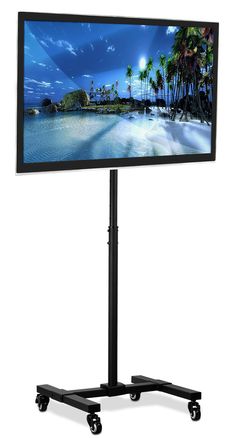 a flat screen tv sitting on top of a black stand