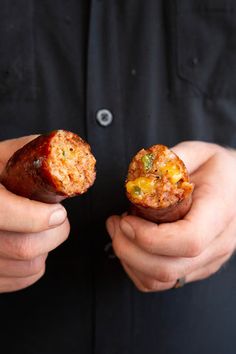 two hands holding food items in their palms