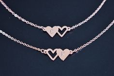 Personalized 2 Girls Sister Necklace, Rose Gold Sister Necklace for 2, Daughters Girls Jewelry, Rose Gold 2 Heart Necklace, Gift for her the listing is for 2 pieces of necklaces. heart charms is made of stainless steel, rose gold plated Handstamped Initials on charms. Charms size approx 8mm x 20mm and the length made at 18'', if you want different length, you can leave message with the order you placed. i will do that for you. the necklace comes with gift box, is ready for gift giving. the neckl Personalized Heart Necklace For Friendship, Personalized Double Heart Necklaces For Friendship, Personalized Double Heart Friendship Necklace, Double Heart Charm Necklace Valentine's Day Gift, Cute Personalized Double Heart Jewelry, Personalized Cute Double Heart Jewelry, Cute Customized Heart-shaped Jewelry, Customized Cute Heart-shaped Jewelry, Customized Cute Heart Jewelry